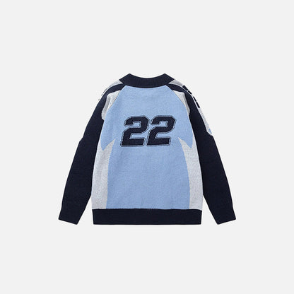 Back view of the blue Turbo Drive Sweater in a gray background