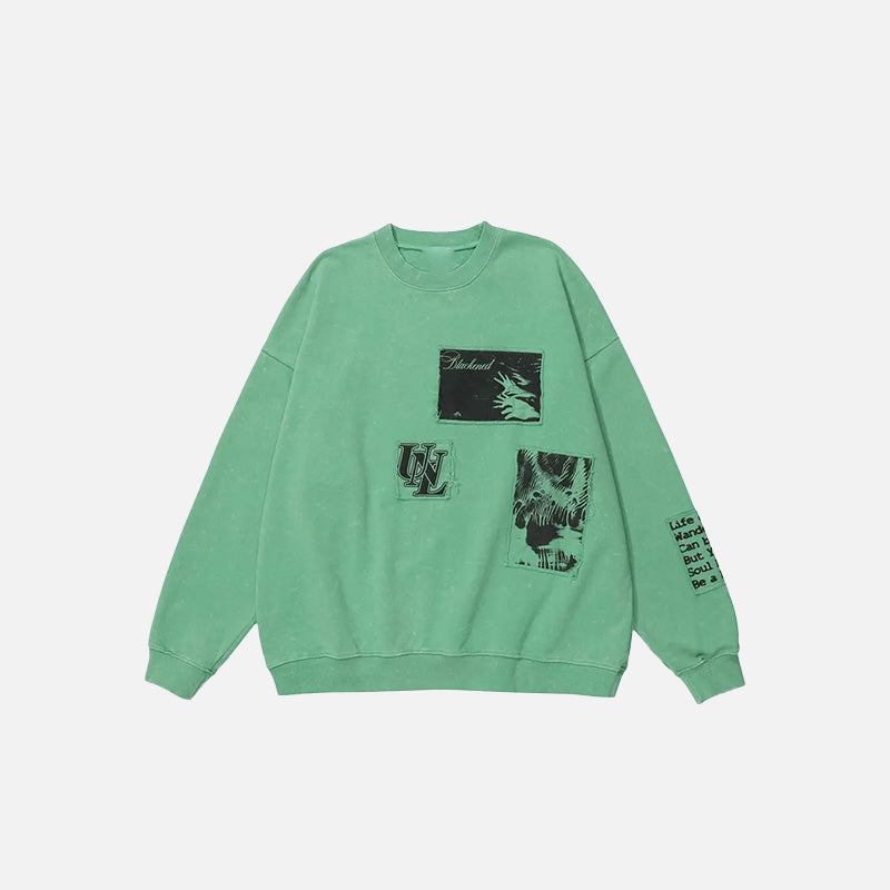 Front view of the green Urban Patchwork Sweatshirt in a gray background