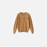Front view of the khaki Timeless Button-Up Sweater in a gray background