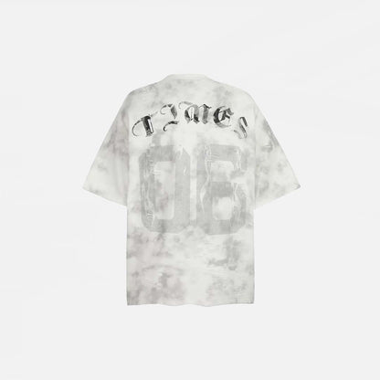 Back view of the white Vintage Graphic Printed Grunge T-Shirt in a gray background
