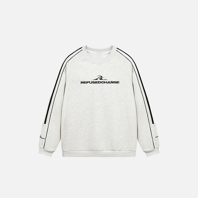 Front view of the white Defiant Stride Sweatshirt in a gray background