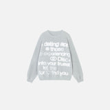 Front view of the gray Love Connection Loose Sweater in a gray background