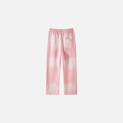 Back view of the pink Casual Noir Relax Pants in a gray background