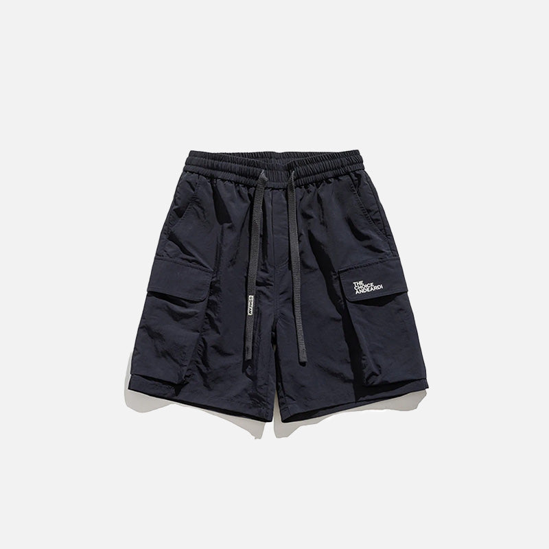 Front view of the navy Essential Utility Cargo Shorts in a gray background