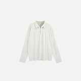 Front view of the white Zippered Collar Edge Shirts in a gray background