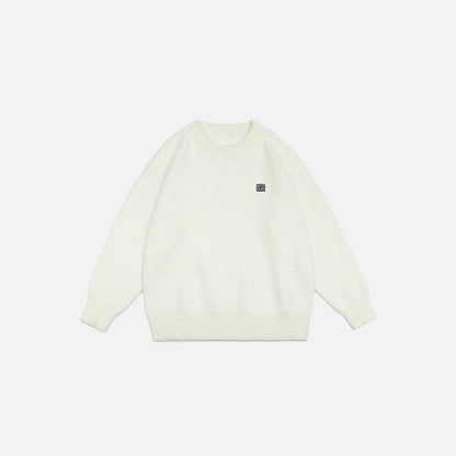 Front view of the beige Classic Cozy Knit Sweatshirt in a gray background