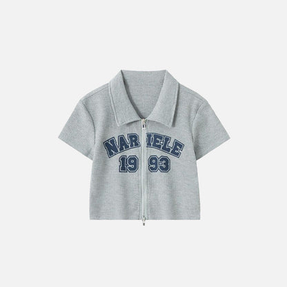 Front view of the grey Women's Retro Graphic Polo Shirt in a gray background