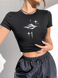 Model wearing the black Starburst Crop Top 