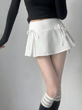 Elegant Bow Pleated Mini Skirt for Chic Summer Style