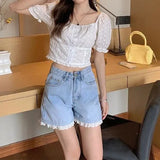 High-Rise Denim Shorts