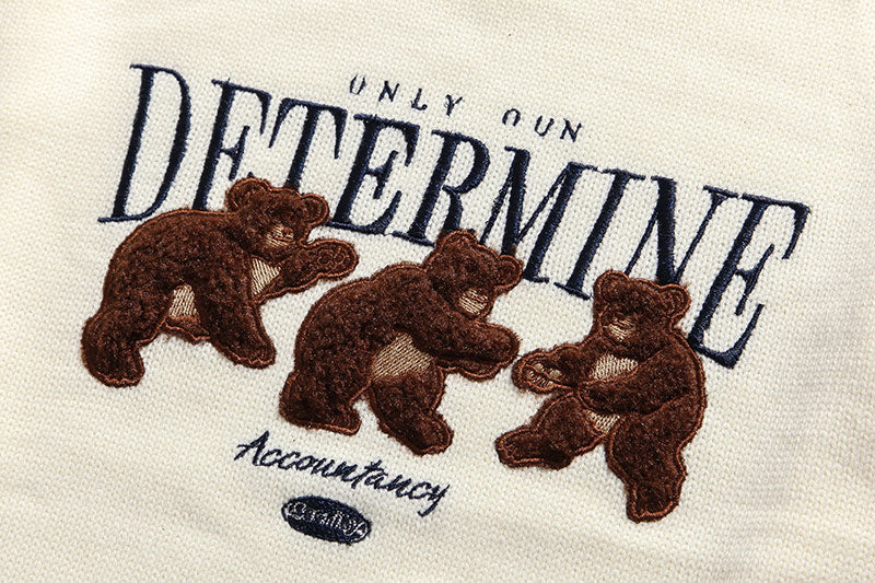 Embroidery print of the white Determine Bear Sweater