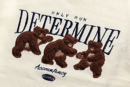 Embroidery print of the white Determine Bear Sweater