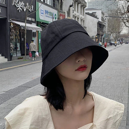 Model wearing the black Urban Explorer Bucket Hat