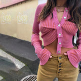 Model wearing the rose red Timeless Knitwear Sweater