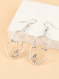 Gold Abstract Hollow Out Face Earrings
