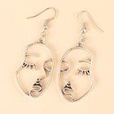 Gold Abstract Hollow Out Face Earrings