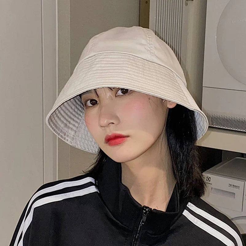 Model wearing the white Urban Explorer Bucket Hat