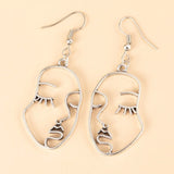 Gold Abstract Hollow Out Face Earrings