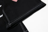 DAXUEN Black wide-leg denim shorts with appliqué details