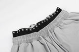 DAXUEN Wide-leg track pants with star graphics