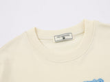 DAXUEN Oversized floral graphic T-shirt in cream