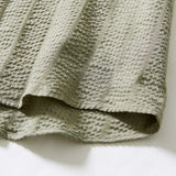DAXUEN Textured short-sleeved button-up shirt in sage green