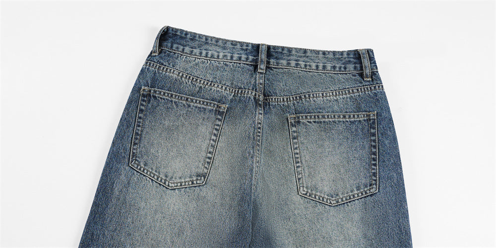 DAXUEN Distressed wide-leg jeans with pyramid studs