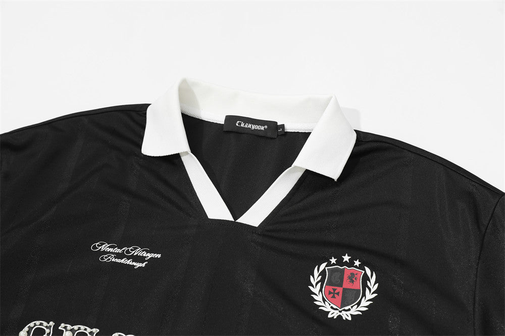 DAXUEN V-neck short-sleeved jersey top with graphic elements