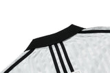 DAXUEN Short-sleeved polo shirt with vertical stripes and graphic text