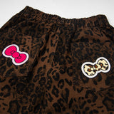 DAXUEN Leopard print wide-leg pants with colorful graphics