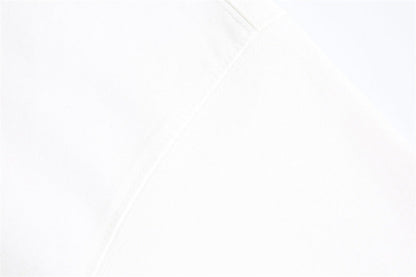 DAXUEN Boxy short-sleeve polo shirt with houndstooth collar