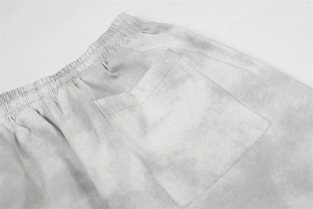 DAXUEN Wide-leg pants with studded graphic design