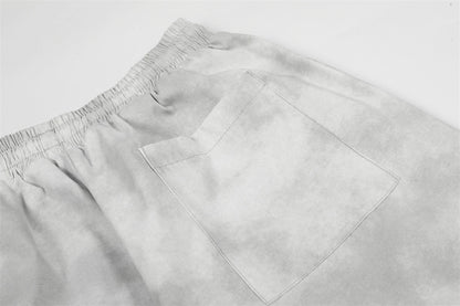 DAXUEN Wide-leg pants with studded graphic design