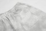DAXUEN Wide-leg pants with studded graphic design