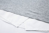 DAXUEN Layered oversized V-neck top with contrasting collar