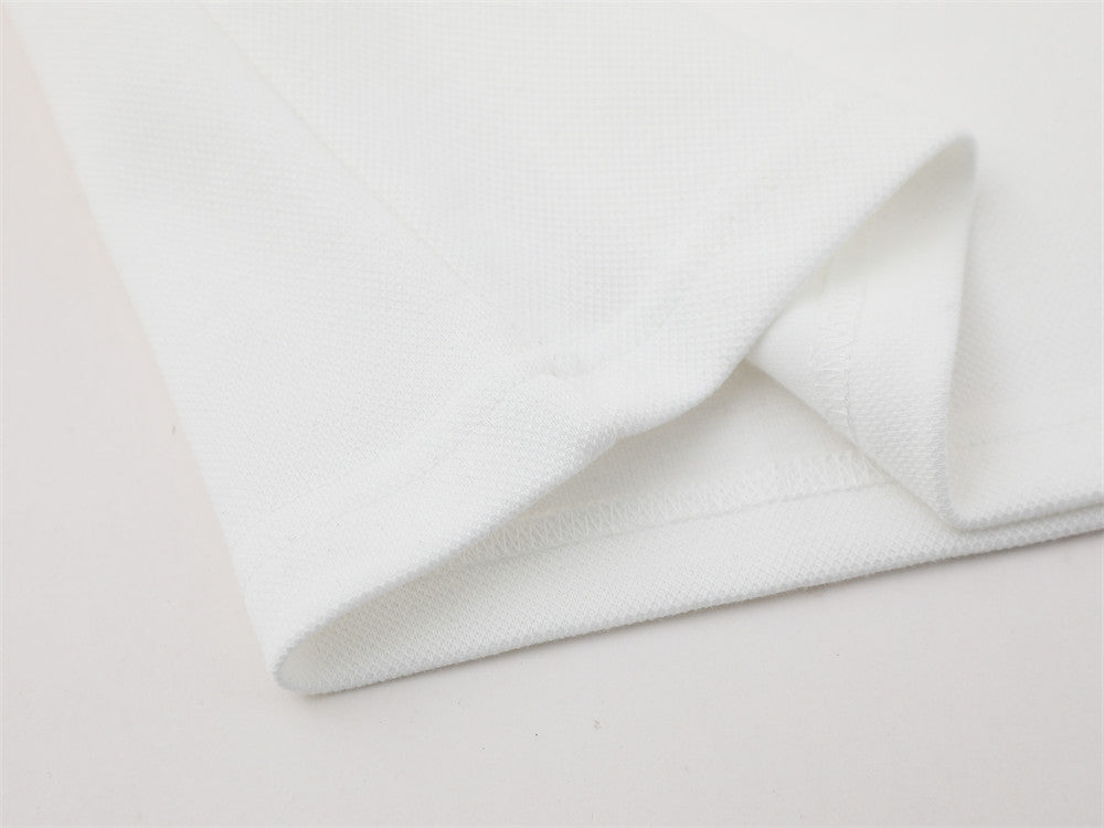 DAXUEN Short-sleeved loose-fitting polo shirt with embroidery