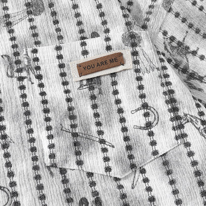 DAXUEN Short-sleeve button-up shirt with abstract graphics