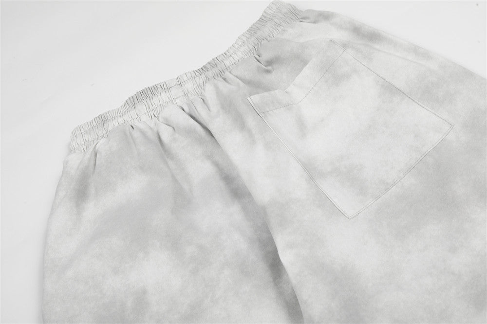 DAXUEN Wide-leg pants with studded graphic design