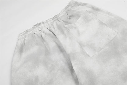 DAXUEN Wide-leg pants with studded graphic design