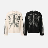 DAXUEN Long sleeve crew-neck top with rib cage graphic