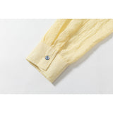 DAXUEN Pale yellow long-sleeved button-up shirt with colorful buttons