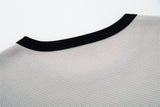 DAXUEN Distressed graphic t-shirt with waffle knit fabric