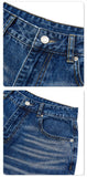 DAXUEN Pair of wide-leg distressed denim shorts