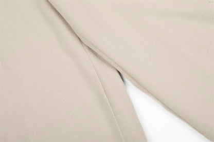 DAXUEN Loose-fitting wide-leg trousers in black and light beige