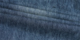 DAXUEN Distressed wide-leg jeans with pyramid studs