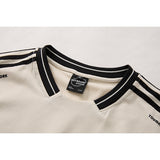 DAXUEN Oversized V-neck t-shirt with waffle knit texture and embroidery