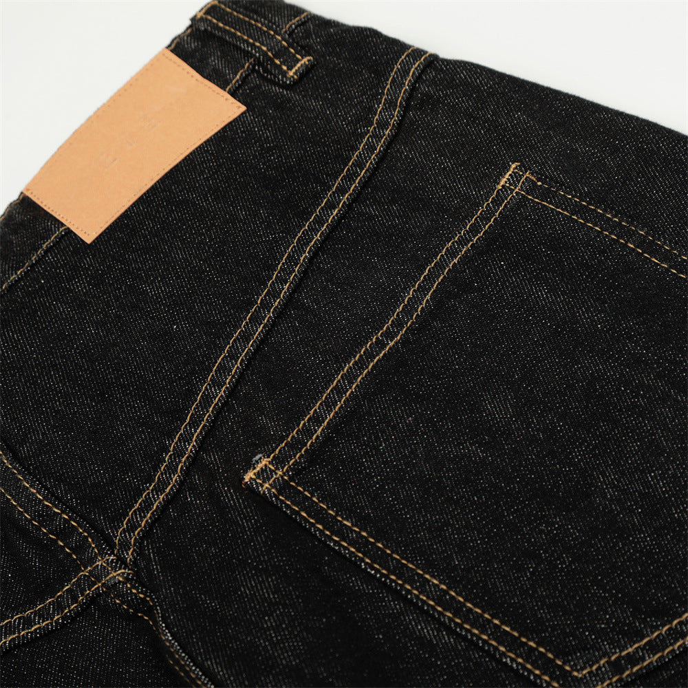 DAXUEN Wide-leg denim jeans with metal details