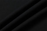 DAXUEN Short-sleeved black t-shirt with metal eyelet graphic