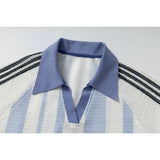 DAXUEN light blue and white striped playful graphic polo top