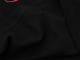DAXUEN Embroidered graphic polo shirt in black and light grey marl